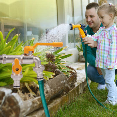 papa et fille devant robinet double sortie arrose